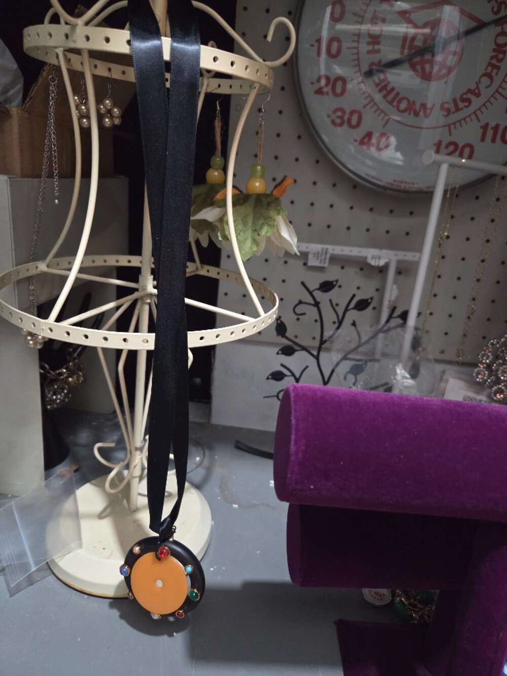 Circle pendant on satin